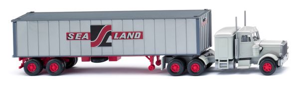 WIK052707 - PETERBILT 6x4 avec porte container et container SEALAND - 1