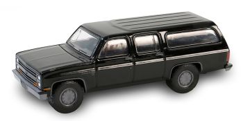 GREEN28150-D - CHEVROLET Suburban C10 custom deluxe 1985 noir de la série BLACK BANDIT sous blister